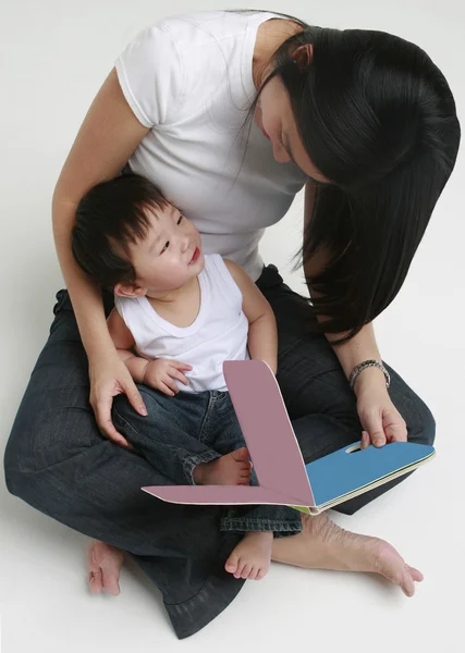 Woman and Child Reading