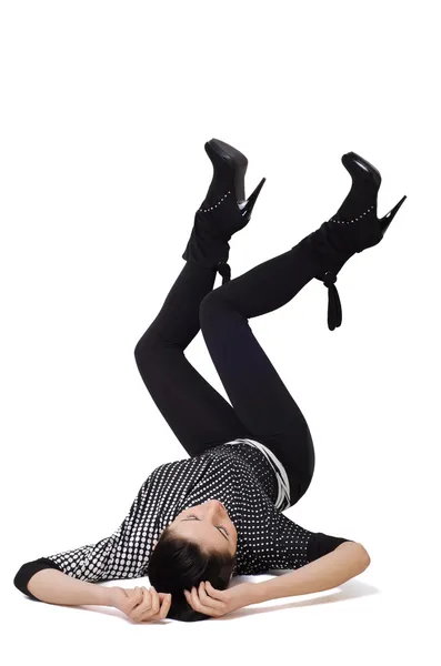 Gyönyörű fiatal nő feküdt hátán, lábát — Stock Fotó
