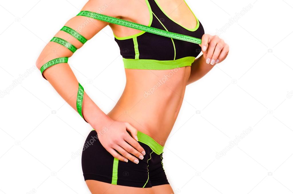 Figure of girl is in a sports wear with a centimetre ribbon on a hand