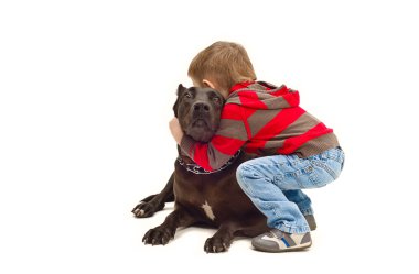 Friendly embraces a child and dog clipart