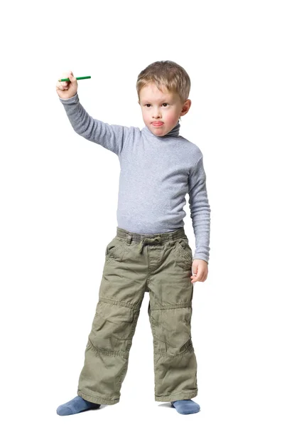 Ragazzo in piedi con la matita in mano — Foto Stock