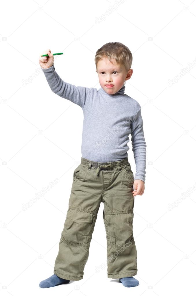 Boy standing with pencil in hand