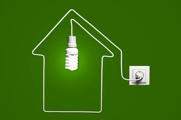 Gloeiende gloeilamp in een huis — Stockfoto