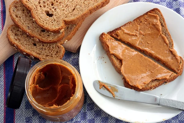Peanut butter on toast — Stock Photo, Image