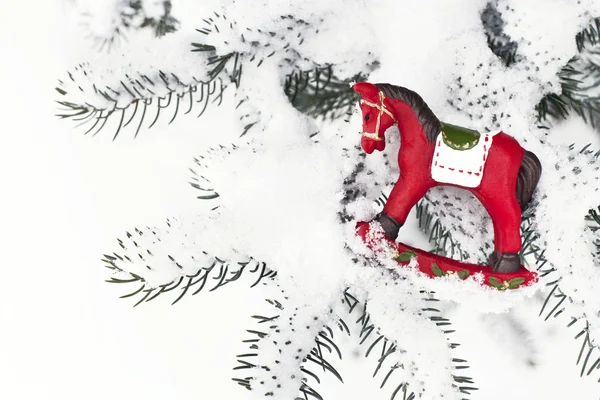 Brinquedo de Natal. Cavalo de madeira vermelho — Fotografia de Stock