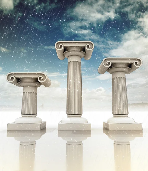 Three ancient Greek Ionian columns wintertime — Stock Photo, Image