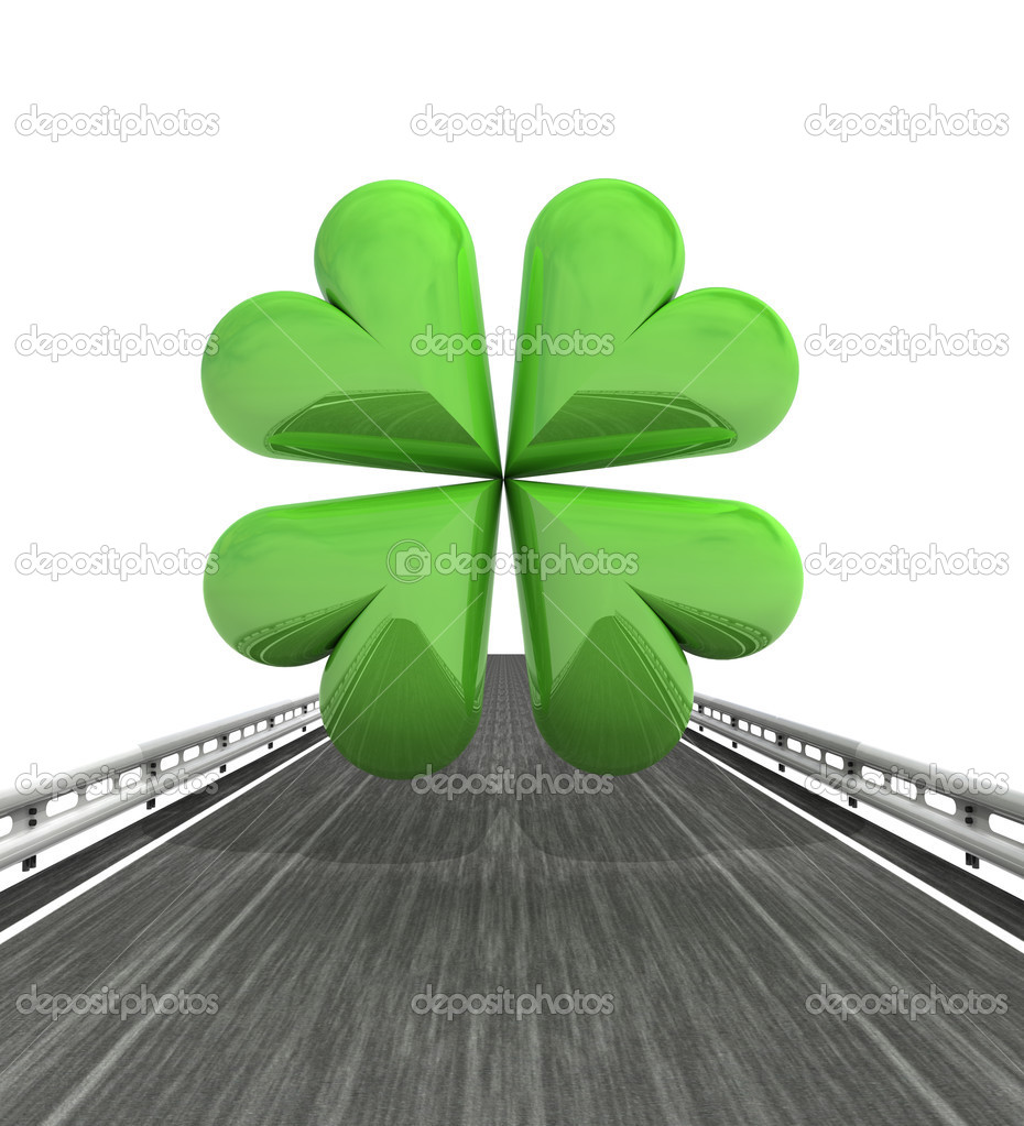 isolated highway with green cloverleaf