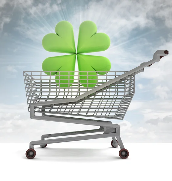 Carrinho de compras com trevo verde e clarão do céu — Fotografia de Stock