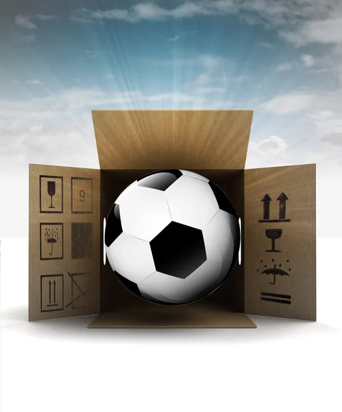 Football ball in package delivery with sky flare — Stock Photo, Image