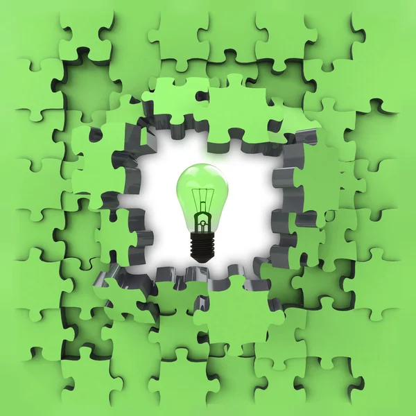 Green puzzle jigsaw with shiny bulb revelation — Stock Photo, Image