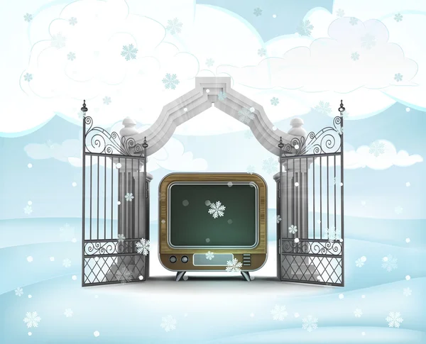 冬の降雪のテレビとのクリスマスのゲートの入口 — ストック写真