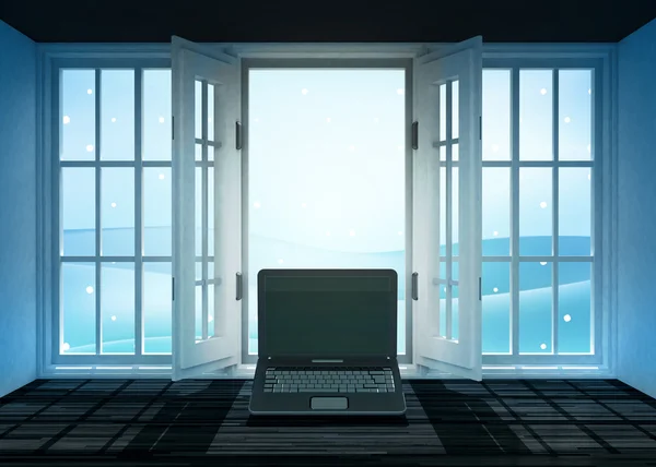 Open doorway with new laptop and winter landscape scene behind — Stock Photo, Image