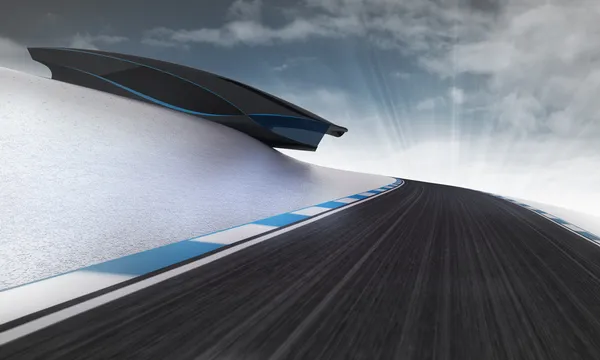 Pista de carreras de velocidad que conduce bajo edificio futurista con fondo de pantalla de cielo — Foto de Stock