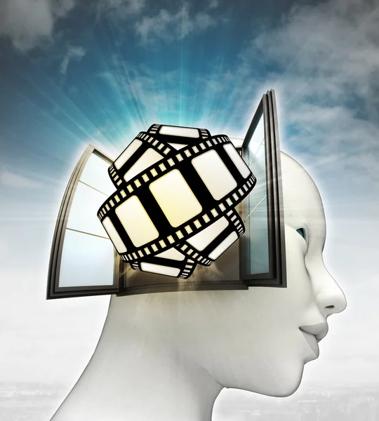 movie tape fun coming out or in human head with sky background