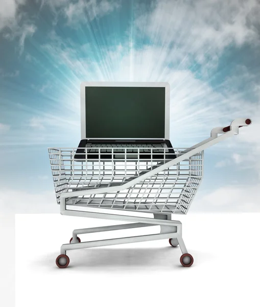 Köpte ny laptop i kundvagn med himmel — Stockfoto