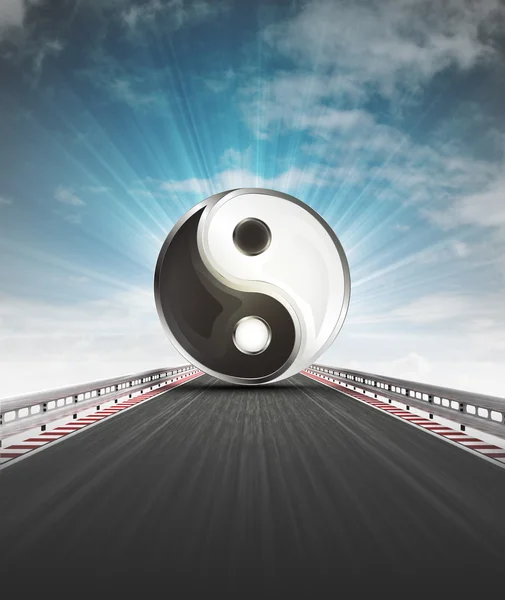 Yin and yang on motorway leading to harmony with sky flare — Stock Photo, Image