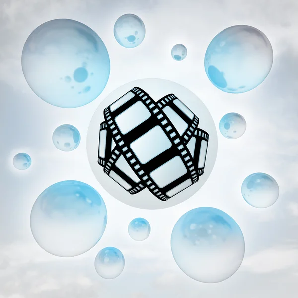 Movie tape icon with glossy bubbles in the air with flare — Stock Photo, Image