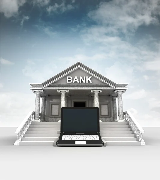 New laptop in front of bank in classic style with sky — Stock Photo, Image
