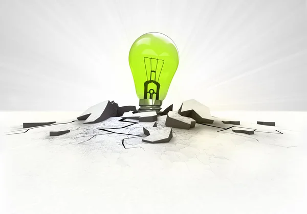 Green lightbulb stuck into ground with flare concept — Stock Photo, Image