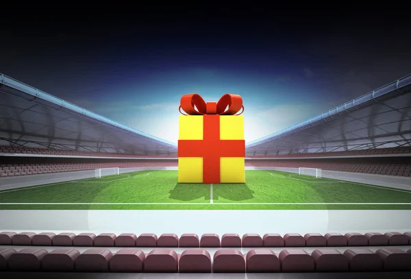 Gift box surprise in midfield of magic football stadium — Stock Photo, Image