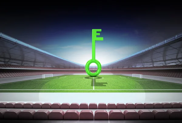 Green key in midfield of magic football stadium — Stock Photo, Image