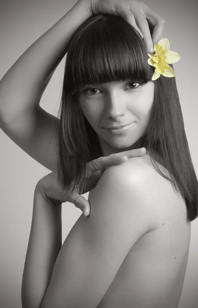 Beautiful woman with flower — Stock Photo, Image