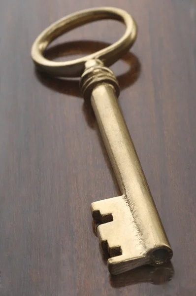 Antique golden key — Stock Photo, Image