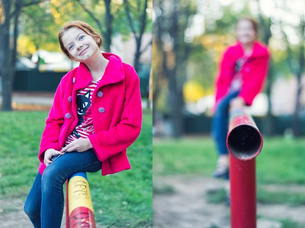 En flicka leker i en park — Stockfoto