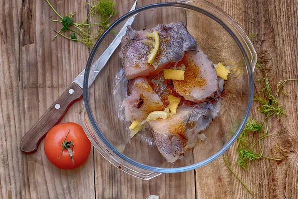 Raw fish is cut by slices with seasoning in ice — Stock Photo, Image