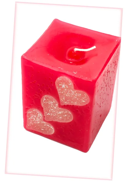 Vela roja con corazones hechos a mano Imagen De Stock