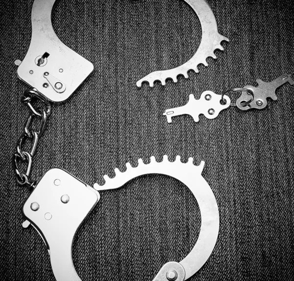 Handcuffs with two keys — Stock Photo, Image