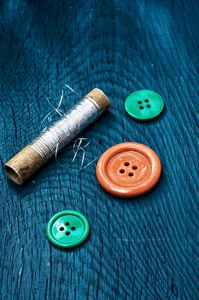 Buttons and sewing tool — Stock Photo, Image