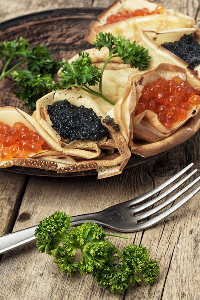 Pancakes stuffed with seafood