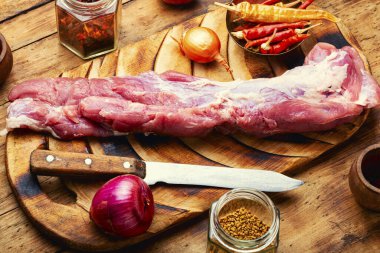 Appetizing raw pork meat for cooking. Raw meat and spices set