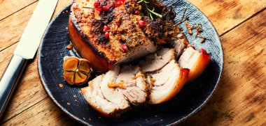 Juicy fried pork belly with spices, herbs and pomegranate.