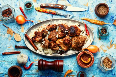 Hint baharatlı, sirkeli domuz rostosu, vindaloo..