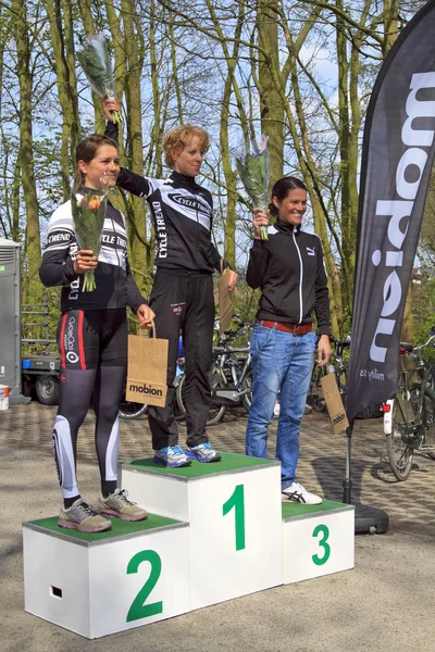 Celebrating on the winners podium — Stock Photo, Image