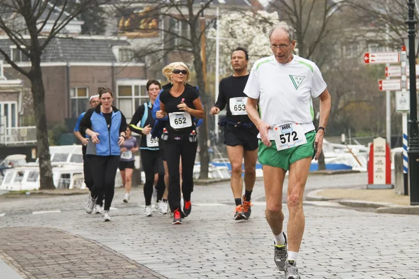 DORDRECHT, THE NETHERLANDS - APRIL 3 2011: runners in