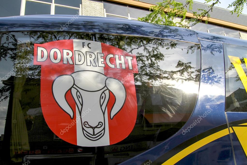 DORDRECHT, NETHERLANDS - MAY 20 2014: FC Dordrecht soccer players arriving in the players bus as fans cheer on to celebrate the promotion to Eredivisie soccer competition in The Netherlands.
