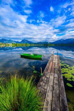 Lake Hopfensee near Fuessen - View of Allgaeu Alps, Bavaria, Germany - paradise travel destination clipart