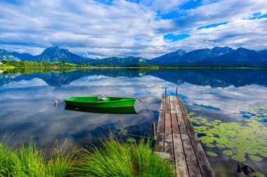 Lake Hopfensee near Fuessen - View of Allgaeu Alps, Bavaria, Germany - paradise travel destination clipart