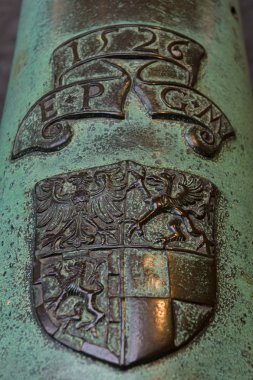 Coats of Arms of the Duchy of Prussia on the old bronze cannon clipart