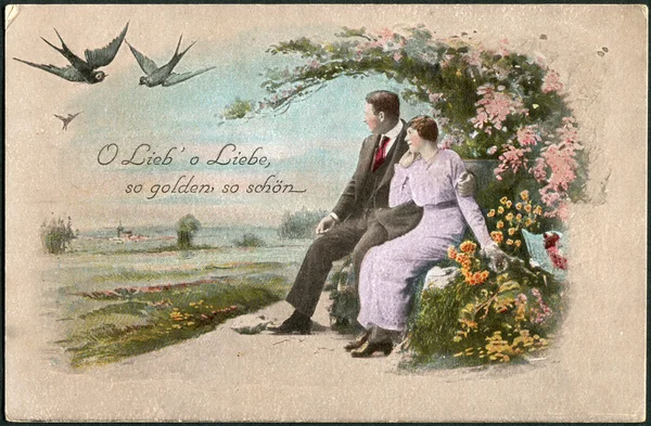 Antigua postal alemana de 1908. Muestra una pareja enamorada . — Foto de Stock