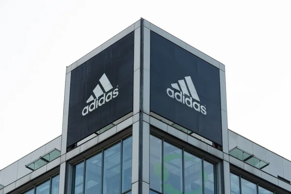 Adidas AG is a German multinational corporation — Stock Photo, Image