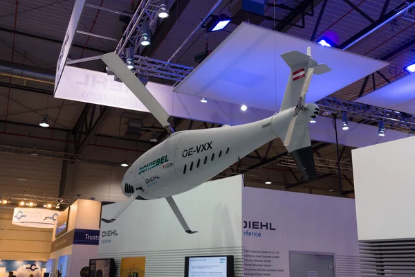 ILA Berlin Air Show 2012. Stand of Diehl Defence. The Schiebel Camcopter S-100 is an Austrian unmanned aerial vehicle (UAV) using a rotorcraft design. — Stock Photo, Image