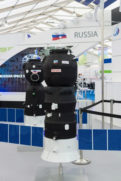 ILA Berlin Air Show 2012. Stand Russian Federal Space Agency. Roscosmos. Model spacecraft Progress and Soyuz. — Stock Photo, Image