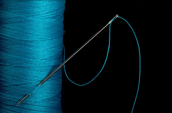 Blue thread with needle — Stock Photo, Image