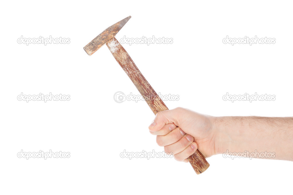 Man holding a old hammer