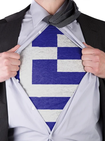 Деловой человек в футболке с греческим флагом — стоковое фото