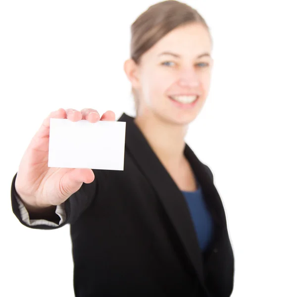 Junge attraktive Geschäftsfrau hält weiße Karte in der Hand — Stockfoto